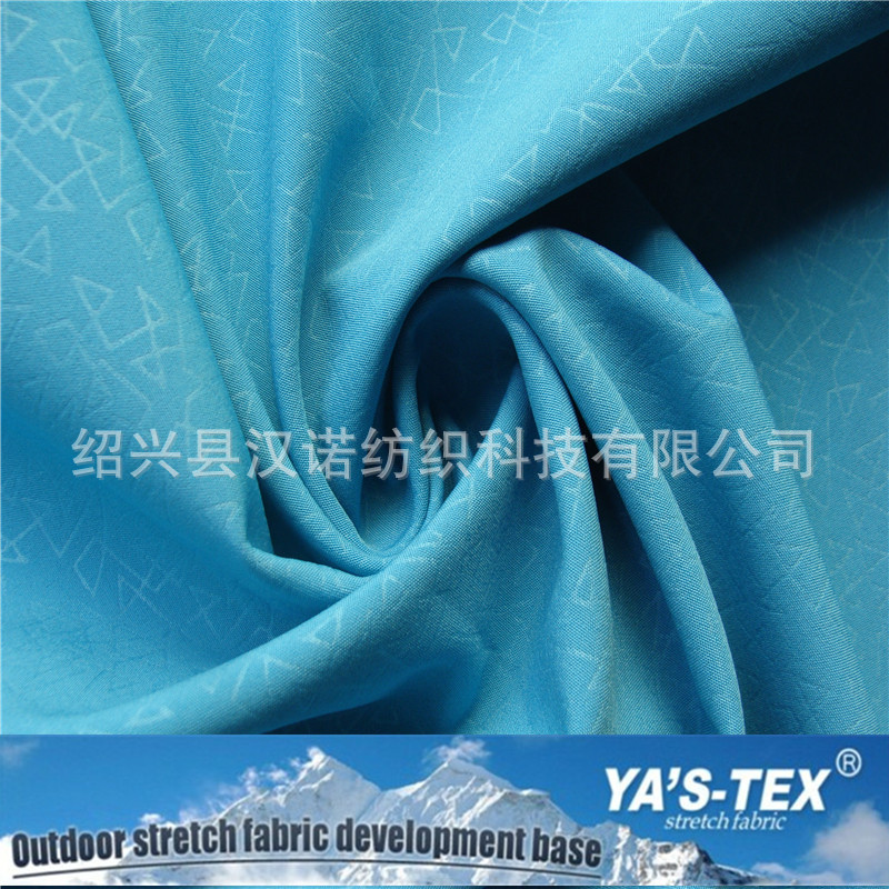 100D embossed polyester four-way elastic composite polar fleece soft shell clothing fabric